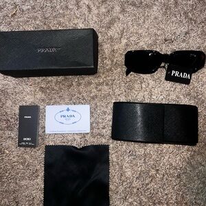 Prada Elegant Black Sunglasses Set